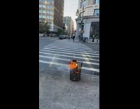 Guy takes video of trash can on fire at NYC 