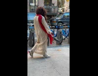 Guy Jesus costume blows leaves on street