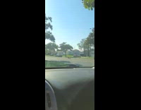 Woman lie down middle street for photoshoot