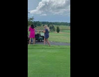Wedding dress girl sits roof golf cart 
