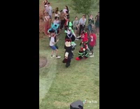 Group of furries dance in a circle 