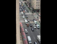 Abandoned hot dog cart causes traffic on busy street