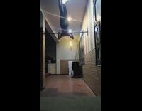 Shirtless guy falls after doing bar trick 