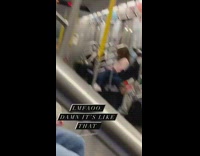 Bicycle locked to yellow pole subway train 