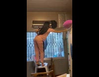 Girl stand on stacked chairs fall down