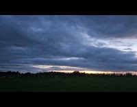 Sunset view on sky seen at field
