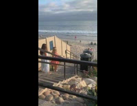 Two women dress tiktok dance stairs beach