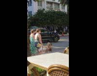 Woman hat bag sit on street tripod