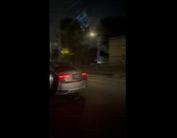 Man drives car with no car door 