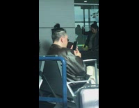 Guy fixes handlebar mustache