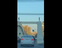 Girl walk hold hand over arch bridge  