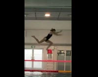 Black bathing suit girl dives pool fail 