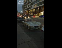 Man Saws and Records Luxury Mercedes Car