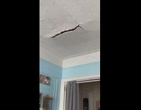White ceiling piece falls 