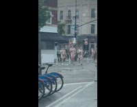 Three guys wear same floral clothes street