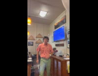 Guy breaks light with golf club swing