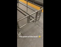 Subway station lock on small gate is pointless