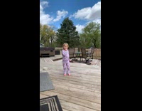 Little girl catches kiss and pretends to throw up 