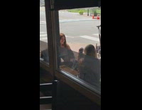 Two women jacket restaurant window photo shoot Part 2