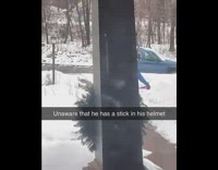 Guy has stick in helmet 