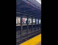 Woman irons hair plugs at train station