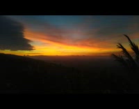 View of sunset from hilltop mountain house 
