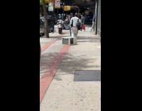 Man walking drags aircon on the ground