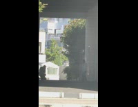 Woman in white top dances on the alley