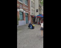 Man with signage sing like a bird
