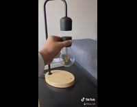 Black lightbulb lamp design magnet side table