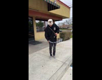 Man teasing friend for wearing checkered vans