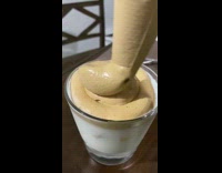 Whipped cream on dalgona coffee