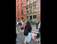Collab WINY - Man with wings stands on subway signage