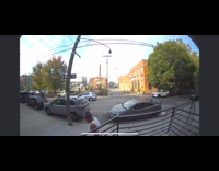 Man walk by then throws pumpkin away