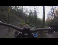 Mountain biker runs into a sleeping bag on biking trail and falls off bike