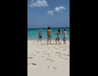 Old man grey shirt dance on beach