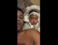 Shirtless guy in bed baby looks surprised what