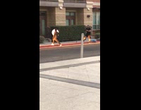 Woman camouflage leggings sidewalk sunset pictorial