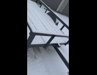 Lady Slides Down Snowy Slope and Slips Under Cart