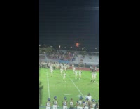 Moon turns orange during football game night