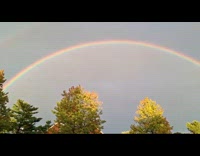 Woman shows double rainbow over neighborhood 