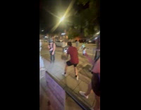 Collab IITW - Woman brown top Records Influencers Record Content on Sidewalk