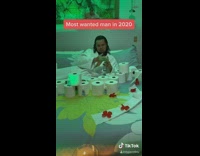 White robe guy lays bed toilet paper 