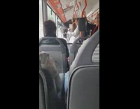 guy doing bicep curls on train subway