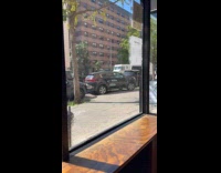 Black car maneuver and drive on sidewalk part 1