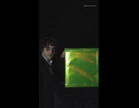 Guy opens green box reveals own head