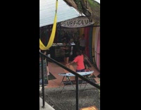 Girl surf club learning to surf on floor