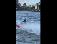 Joker seen jet skiing on river 