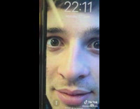 Guy pretending to sleep phone background of himself 