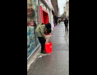 Collab WINY - Man hunched over stick face to the speakers